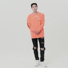 Load and play video in Gallery viewer, RENSUKE RISING SUN THERMOCHROMIC COLOR-CHANGE LOOSE LONG SLEEVE SHIRT IN COTTON JERSEY
